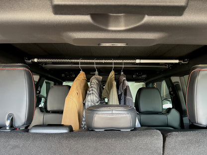 Clothing rack display in Ford Bronco